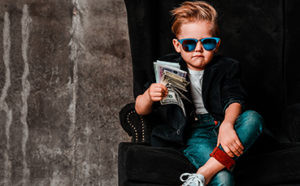 Kid holding spending money