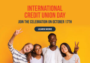 a group of people posing for a photo about international credit union day
