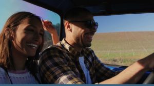a man and woman in a car