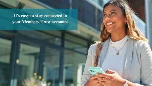 a woman holding a phone